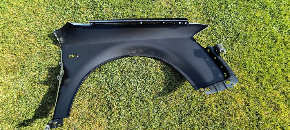 Błotnik nowy audi a4 b7 lewy prawy Srebrny LY7W OCYNK + KONSERWACJA