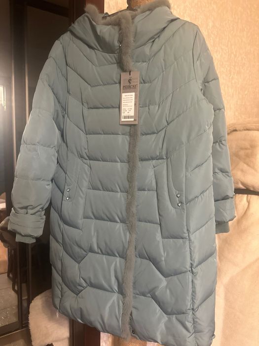 Тепла куртка нова 48-50,XL