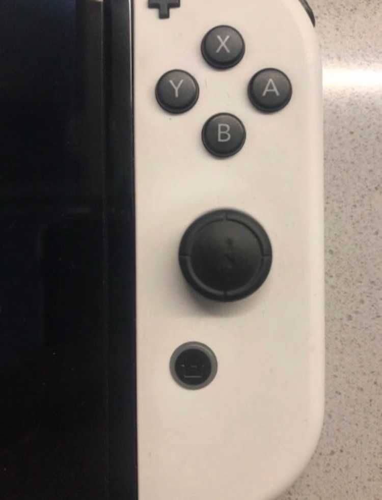 Nintendo switch Oled blanco + joycon extra + estuche protector