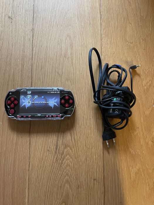Psp 1004 + carregador original + capa de acrilico