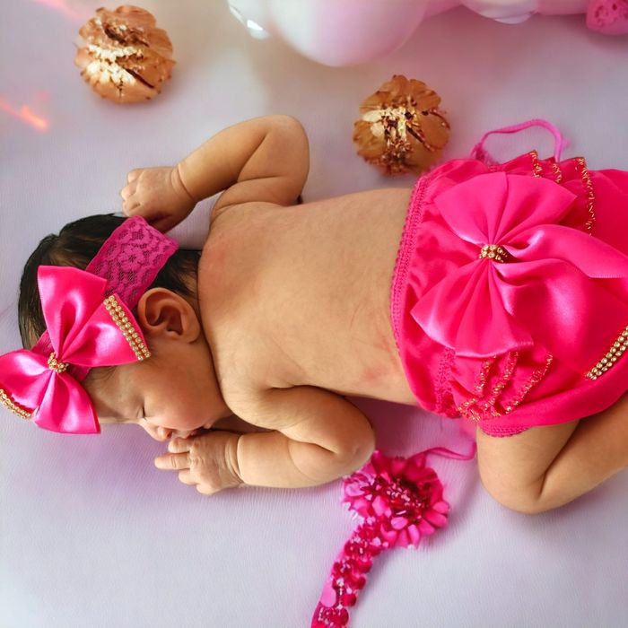 Vendo Tapa fralda + lacinho + sapatinho