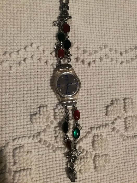 2 relógios de senhora swatch e festina