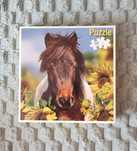 Puzzle koń w słonecznikach