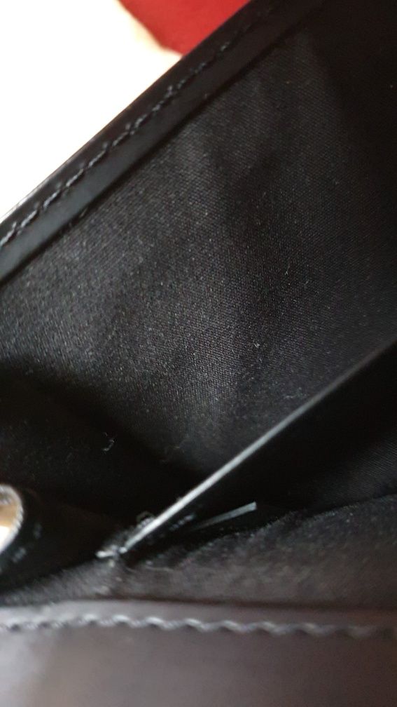 Louis Vuitton LV Honfleur black epi leather clutch.