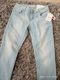 Nowe spodnie dżinsowe 164