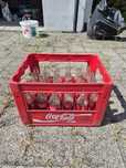 Transporter z butelkami coca-cola