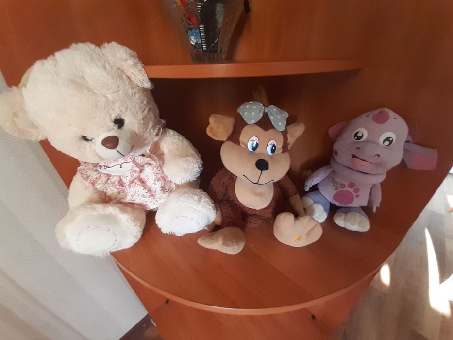 Продам детскую мягкую игрушку.поет песни.