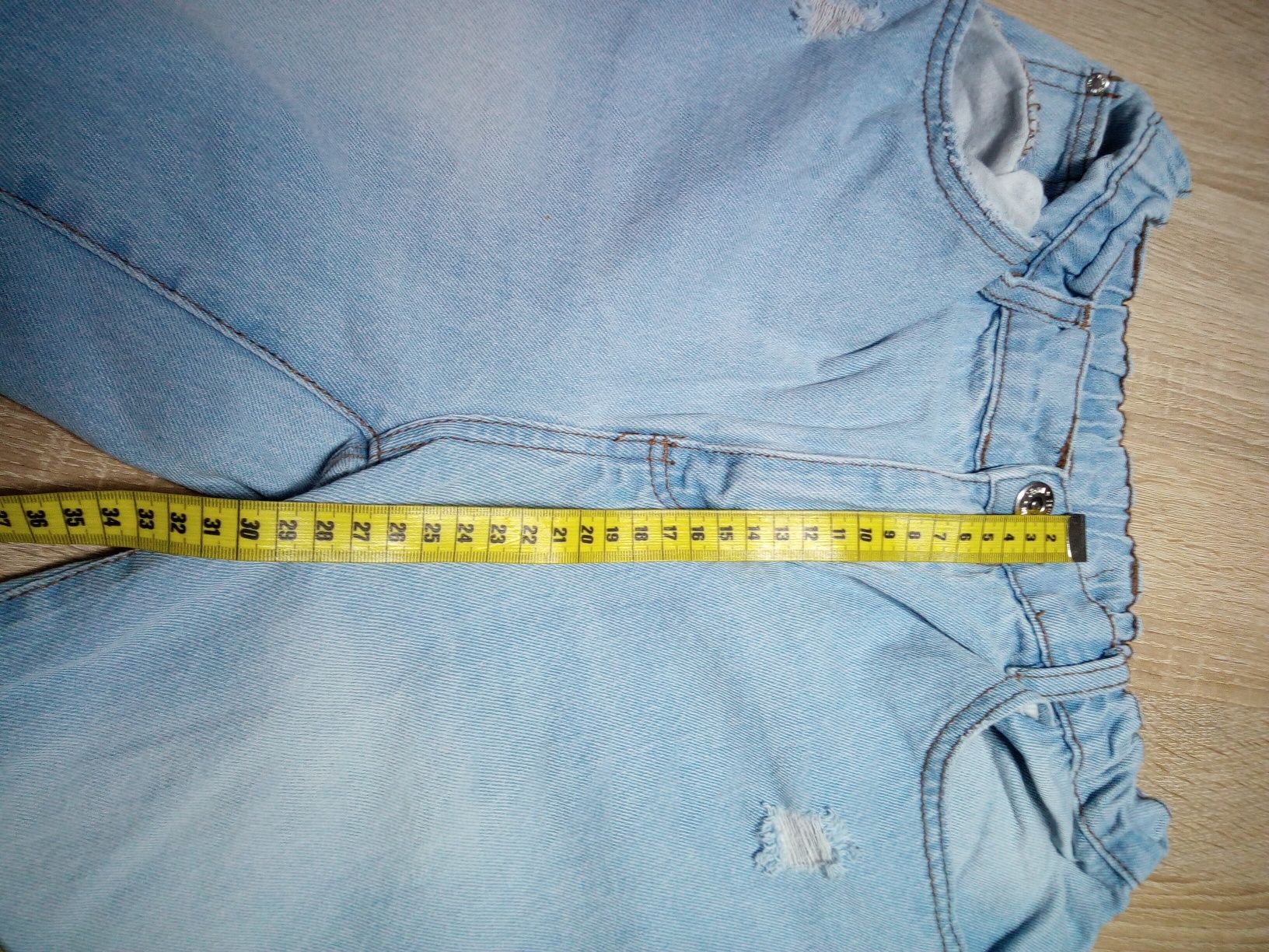 Spodnie jeansowe z dziurami 170cm