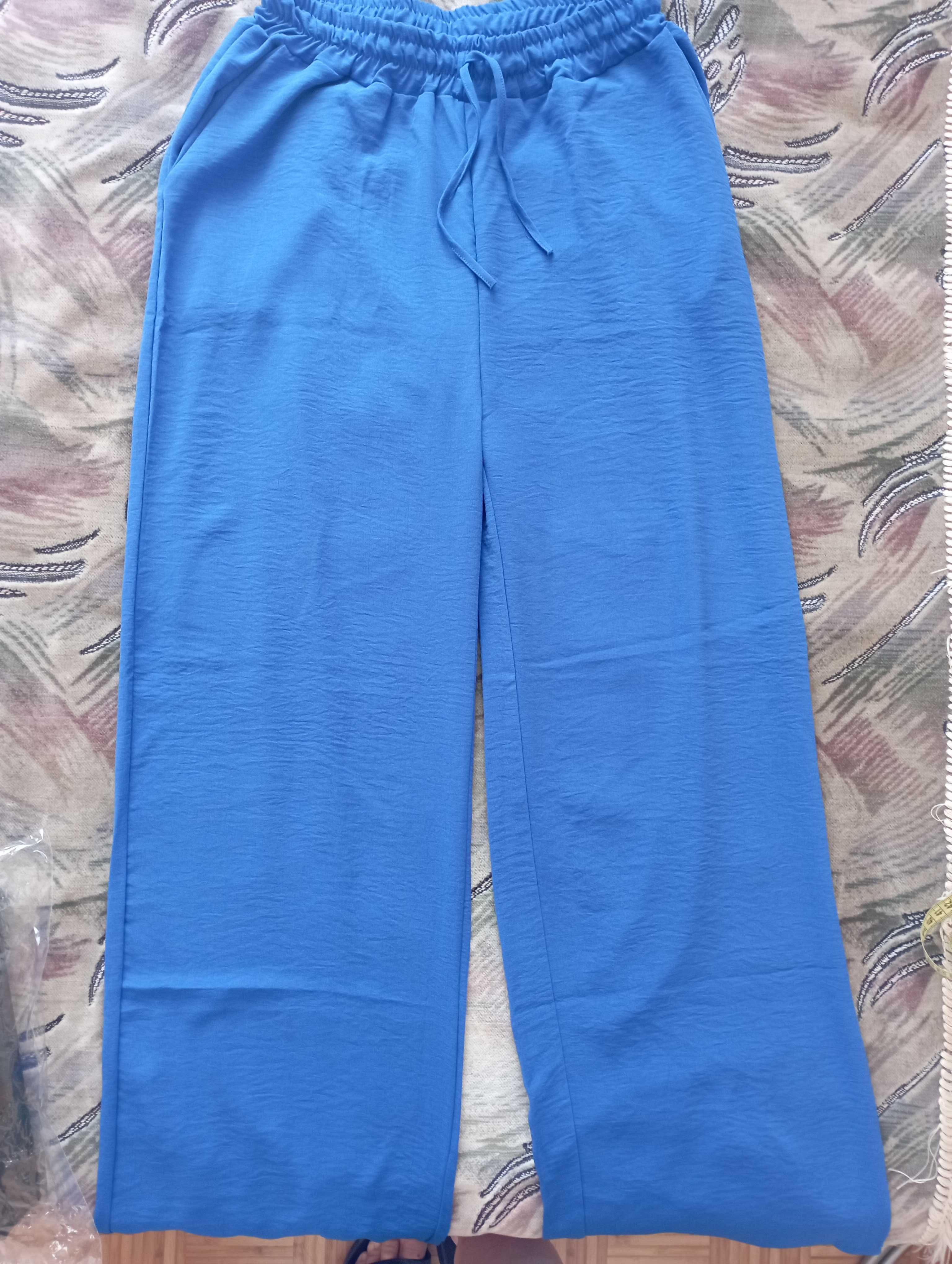 Продам новый костюм