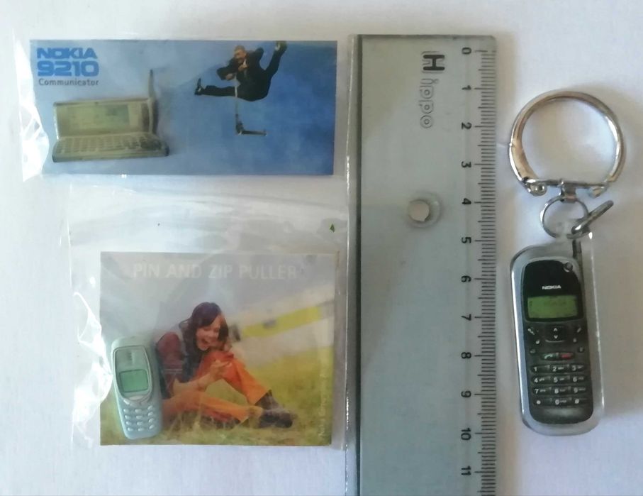 Pins e porta-chaves de publicidade á Nokia