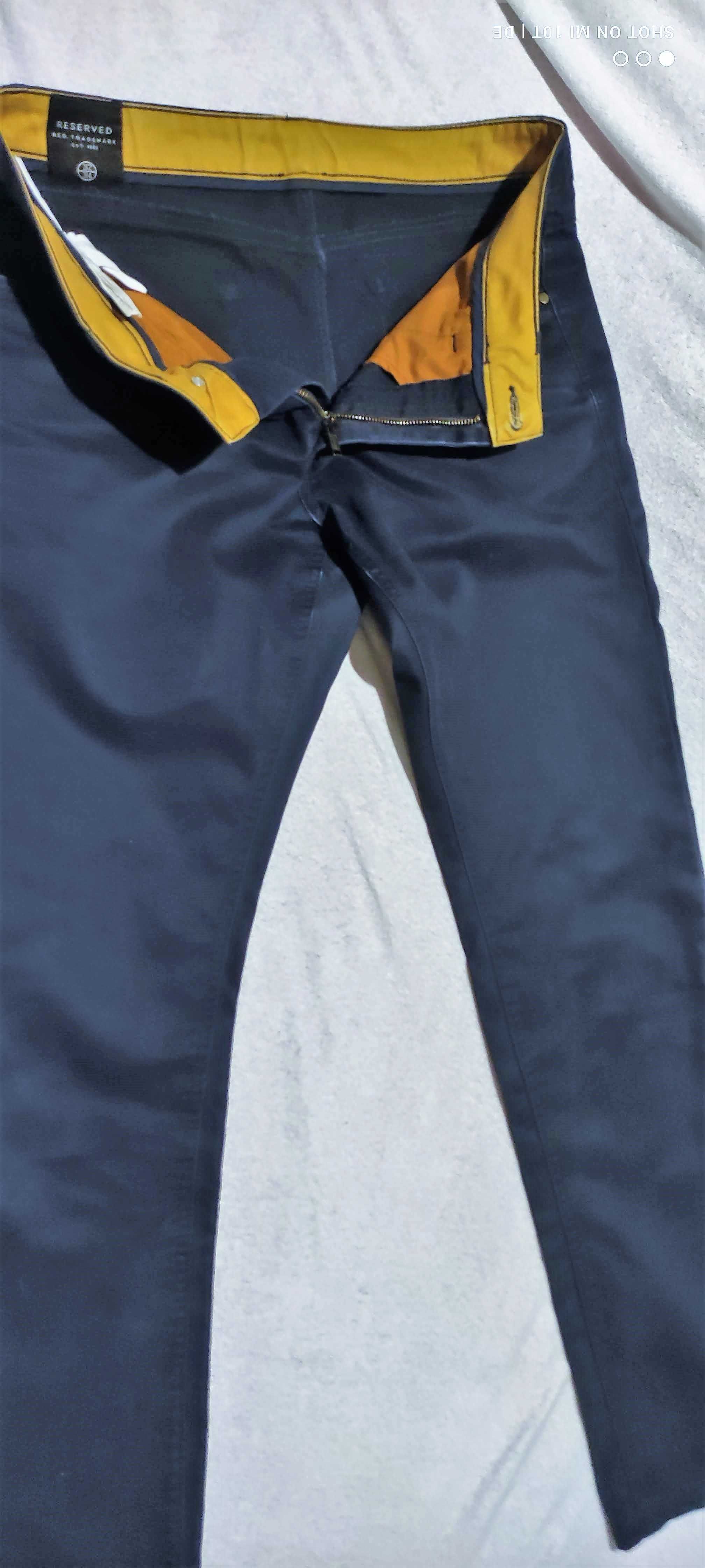 granatowe spodnie materiałowe RESERVED 32/34