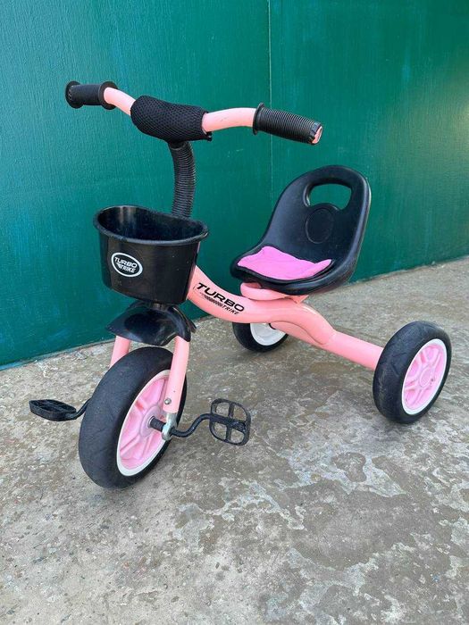 дитячий триколісний рожевий велосипед