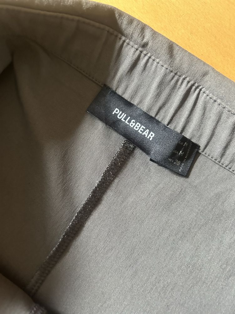 Calças flare com saia Pull&Bear
