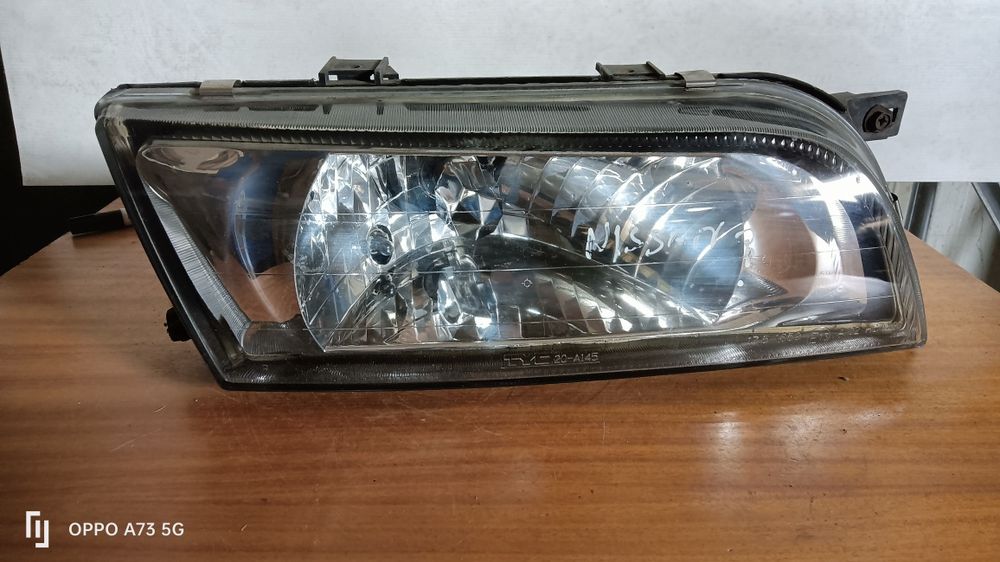 Farol Nissan Almera ótica 1998 direita