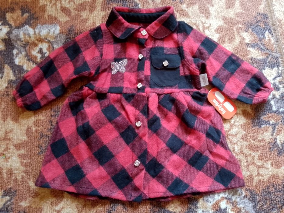 Продам новий костюм і плаття для дівчинки