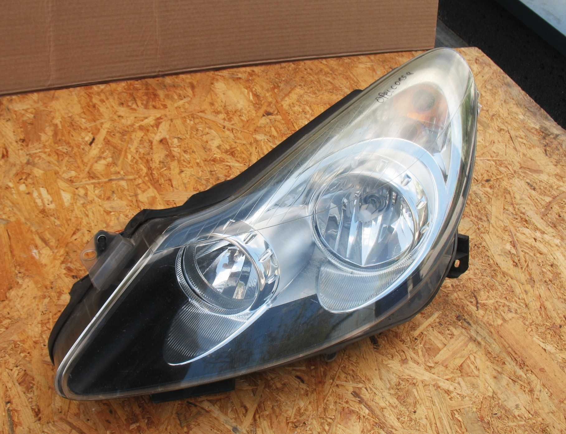 Opel Corsa D lampa Lewa przód Oryginał EU