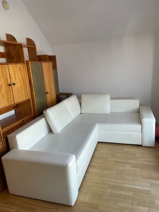 Stylowy narożnik z eko skóry z funkcją spania!