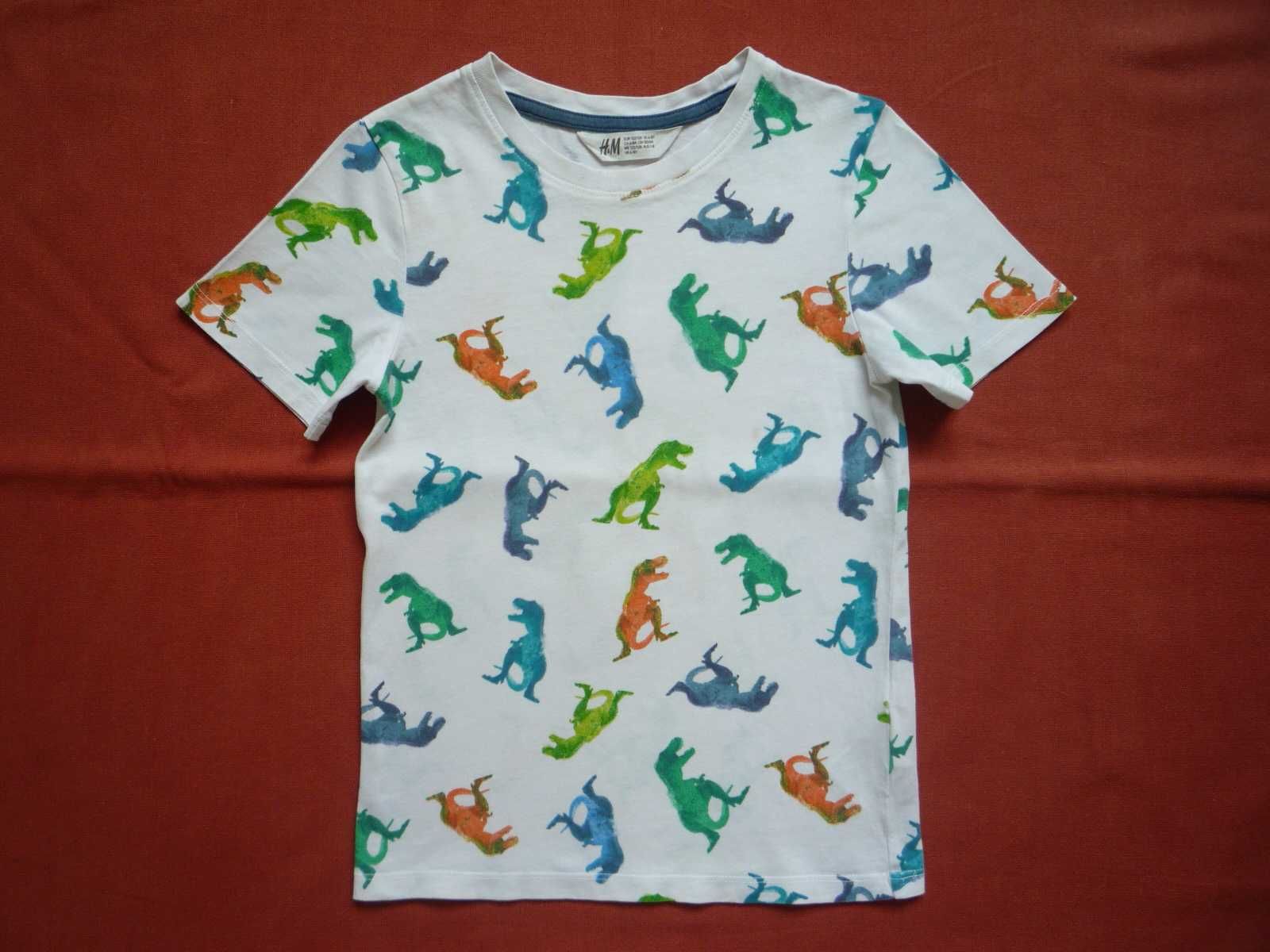 H&M r. 122/128 Biała koszulka w kolorowe dinozaury
