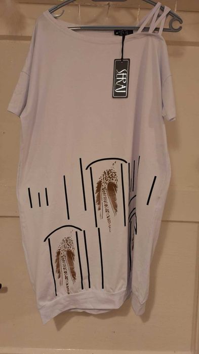 Śliczna  tunika uniwersalna. Piórka.