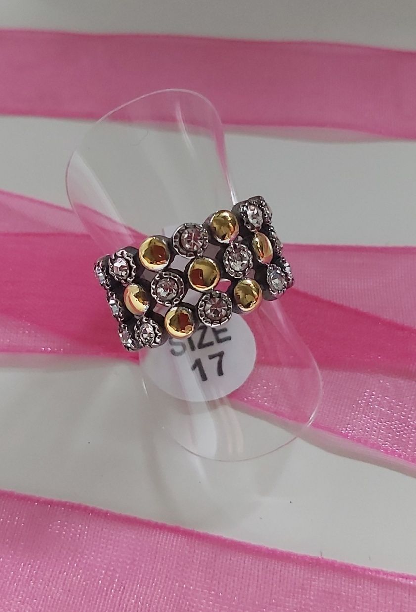 Anel bicolor, em aço, com zirconias. T17