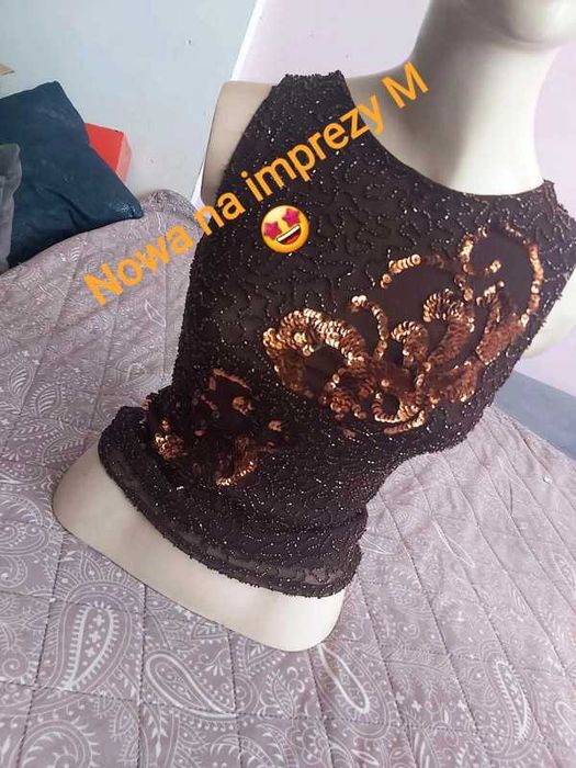 Świąteczna bluzka z cekinami w rozmiarze M/L