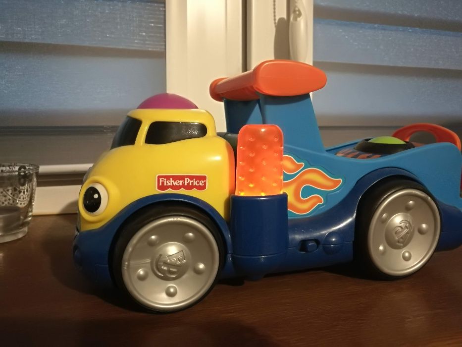 Rozkołysana ciężarówka laweta Fisher Price