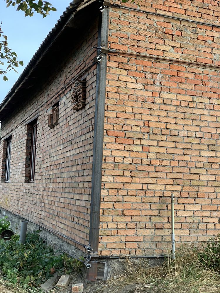 Стяжка будинку хати дома стягування будинків стін арматурою тріщин цін
