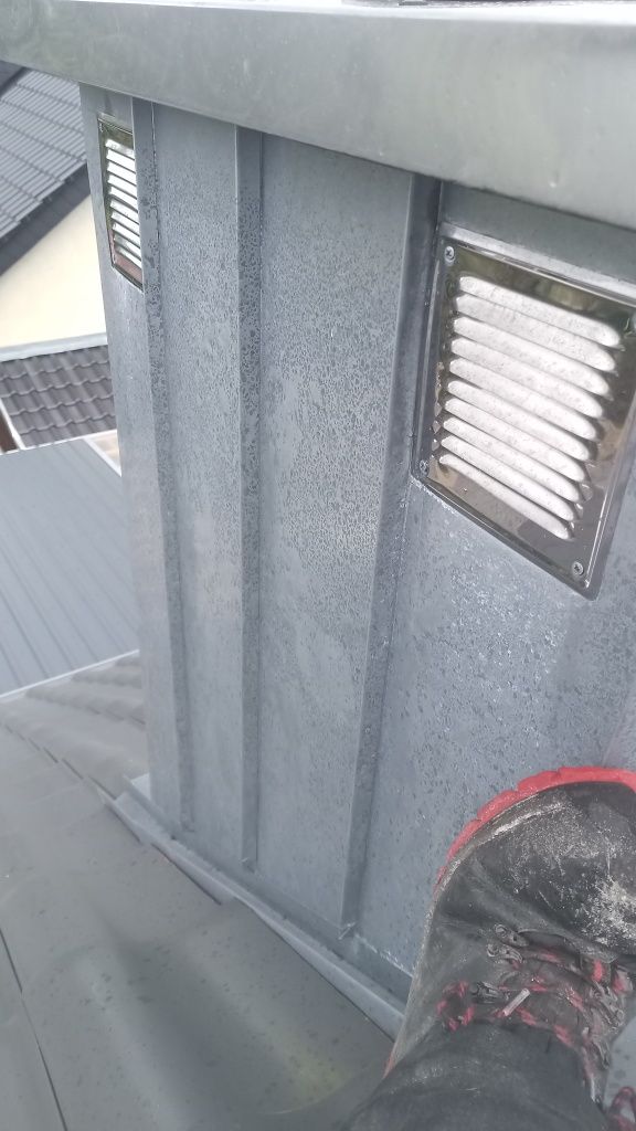 Komin opierzenie okucie blacha  naprawa przeciek dach montaż dekarz