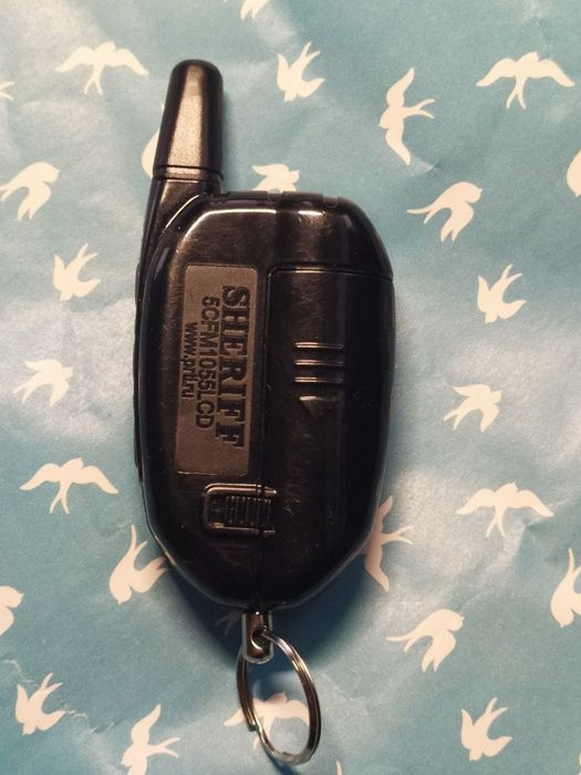 Двух сторонній брелок сигналізації Шериф
