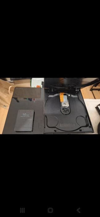 Vendo esta playstatoin 2 com a fita partida