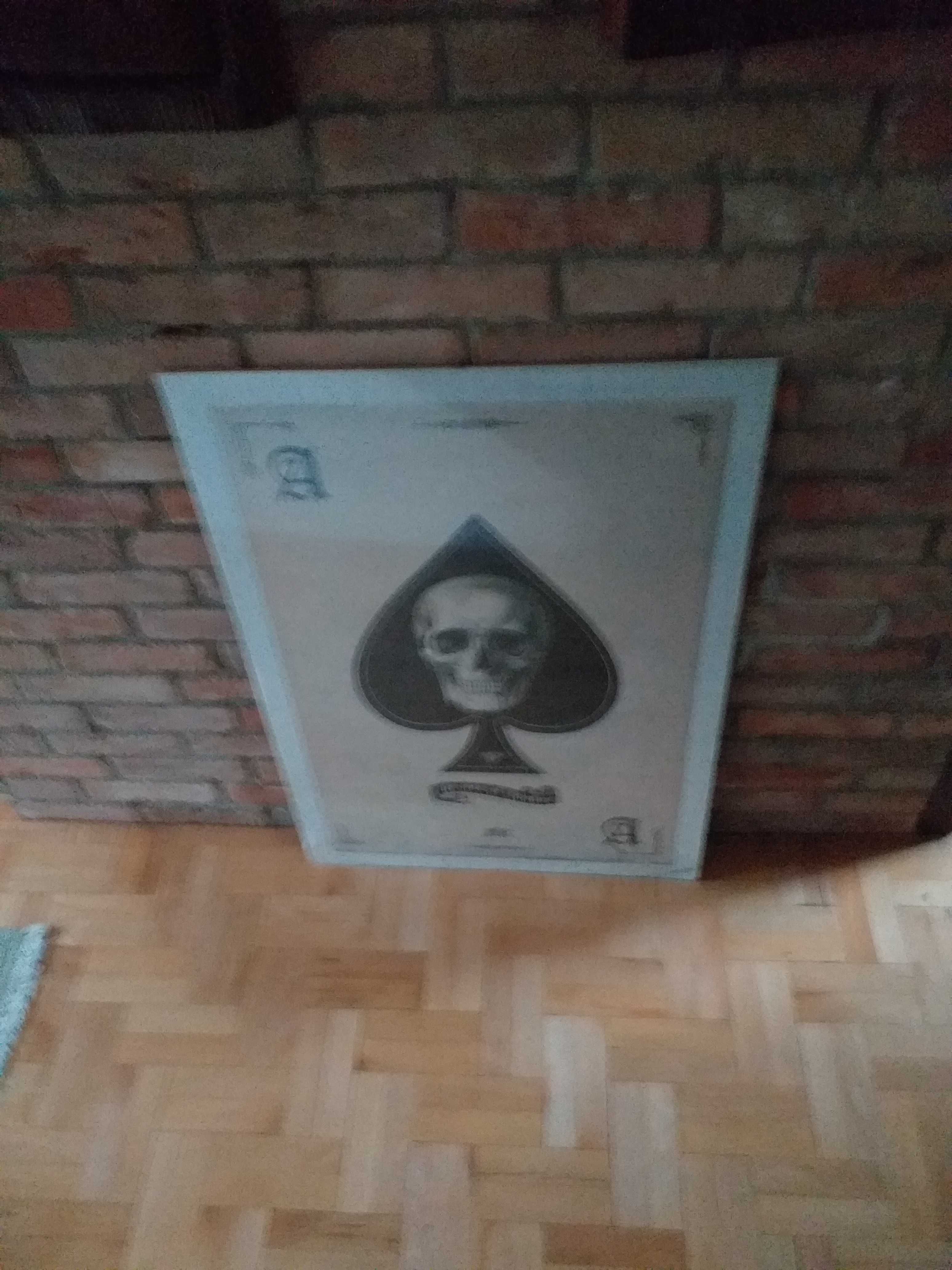 Plakat z  motywem czaszki.