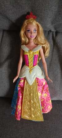 Bonecas Barbie Aurora e fada