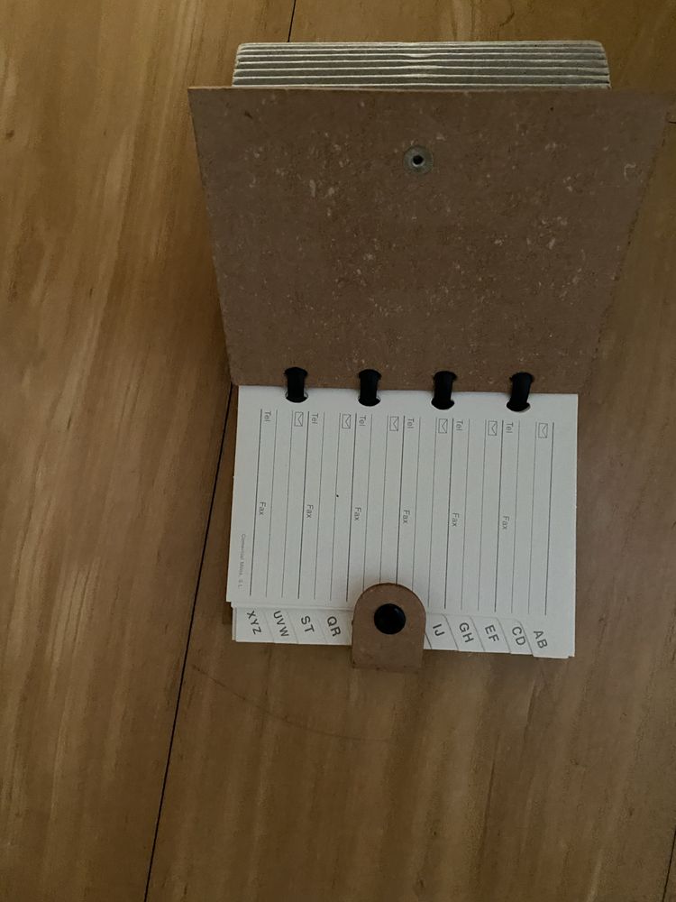 Caderno de notas e lista telefonica