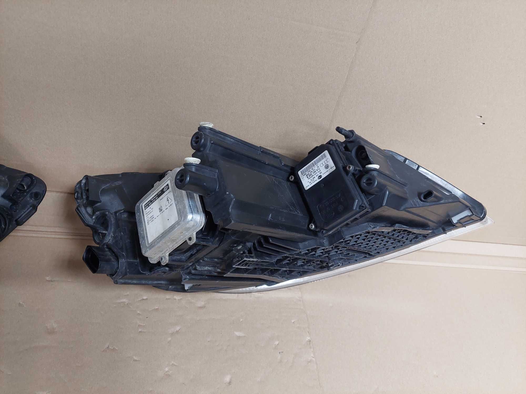 Octavia 2 II LIFT 08-12r lampa przód Bi Xenon skrętny lewa KPL EU BDB