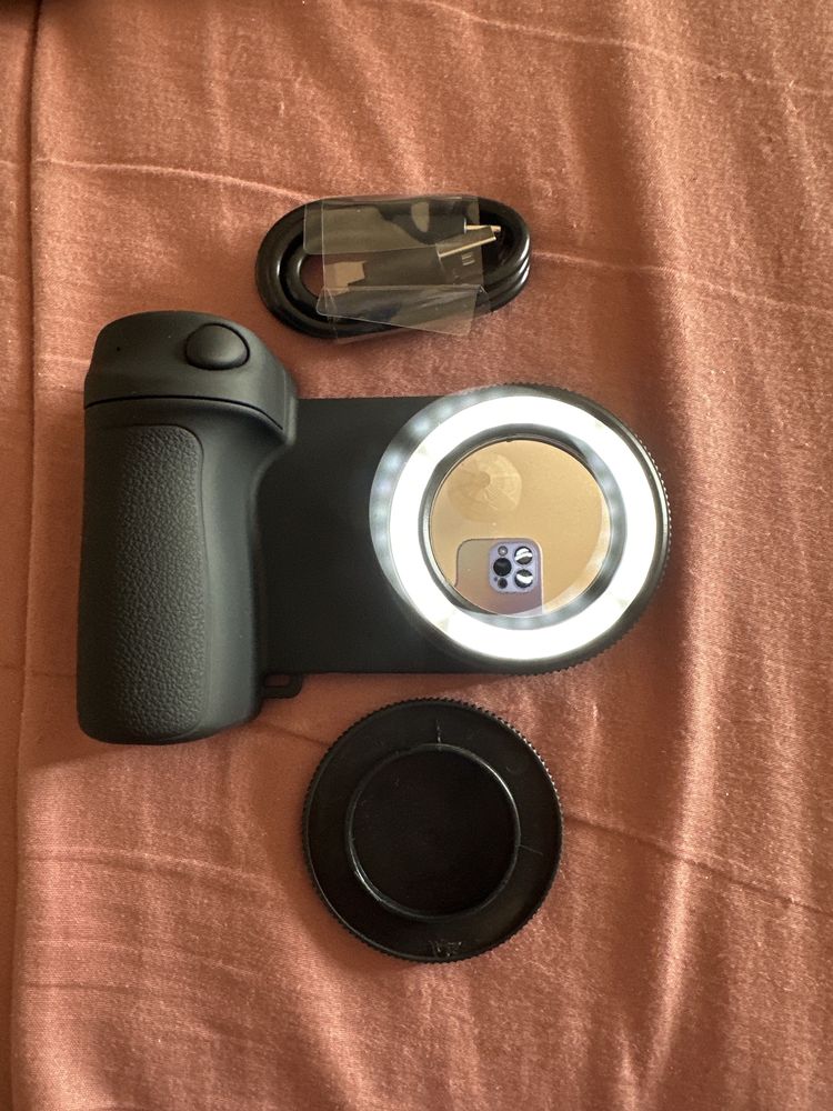 Appio de telemovel com luz para selfie e tambem tira fotos