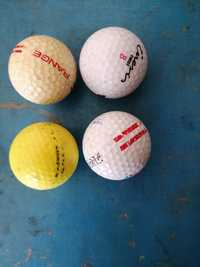 Bolas de golfe e bases de copos