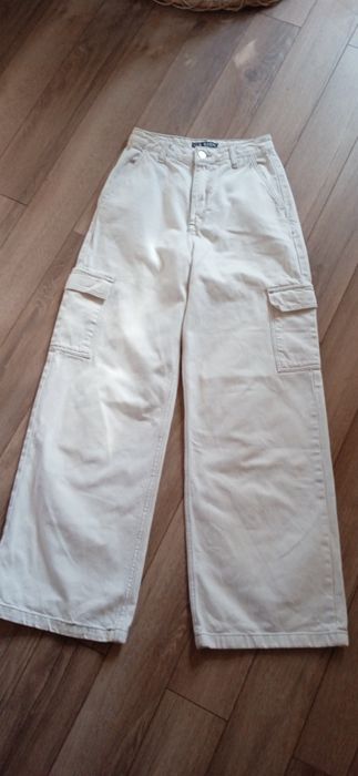 Джинси молочні жіночі