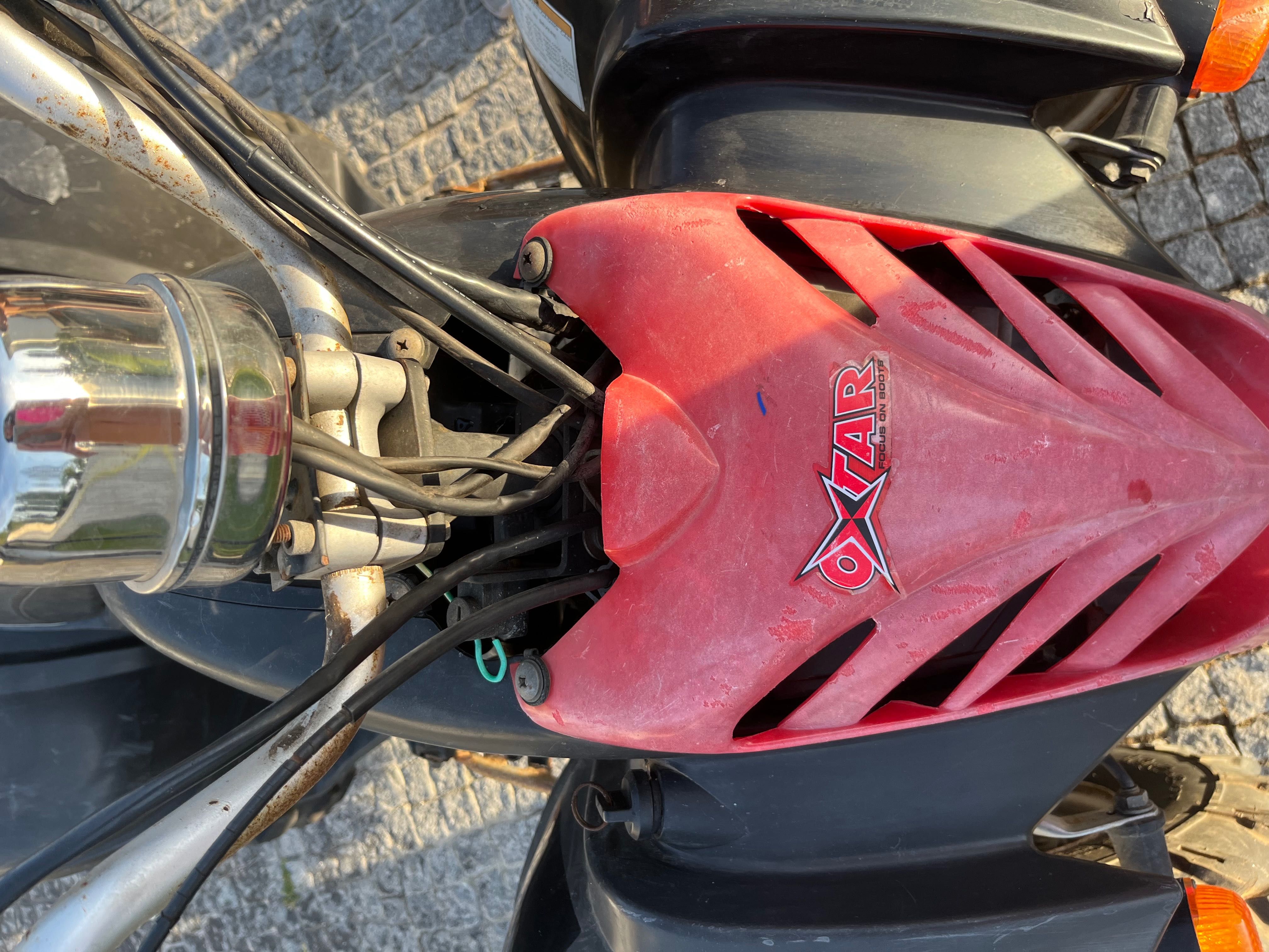 Moto 4 em perfeitas condições, inclui reboque e capacete. Negociável.