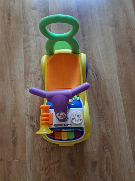 Jeździk, pchacz fisher price muzyczna parada