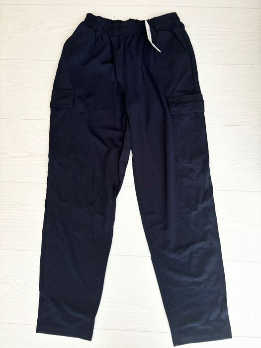 Calças azuis com bolsos