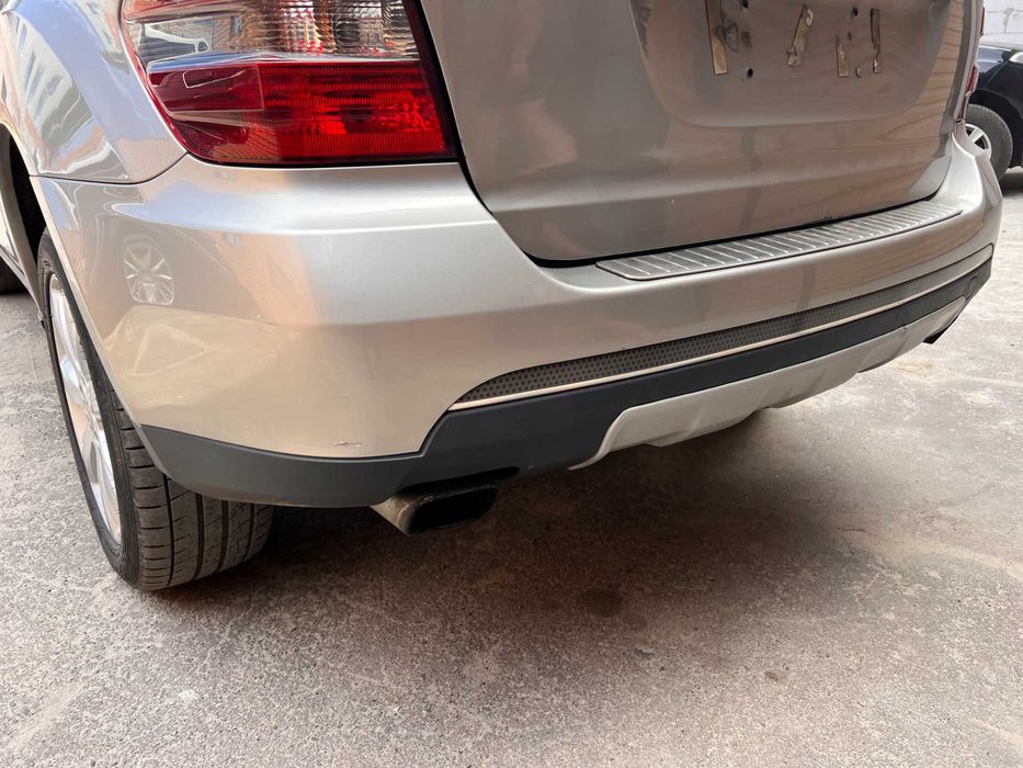 Задний бампер Мерседес ML W164 задній бампер МЛ 164 Дорестайл