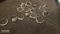 18 pierścionków koloru złotego i srebrnego z cyrkoniami