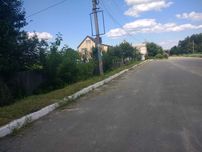 Кутова ділянка в центрі Микуличів. 16 соток можливо під КОМЕРЦІЮ.