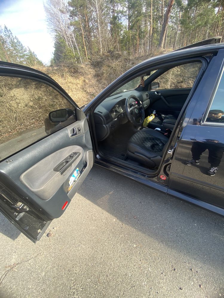 Шкода тур 1.8 автомат