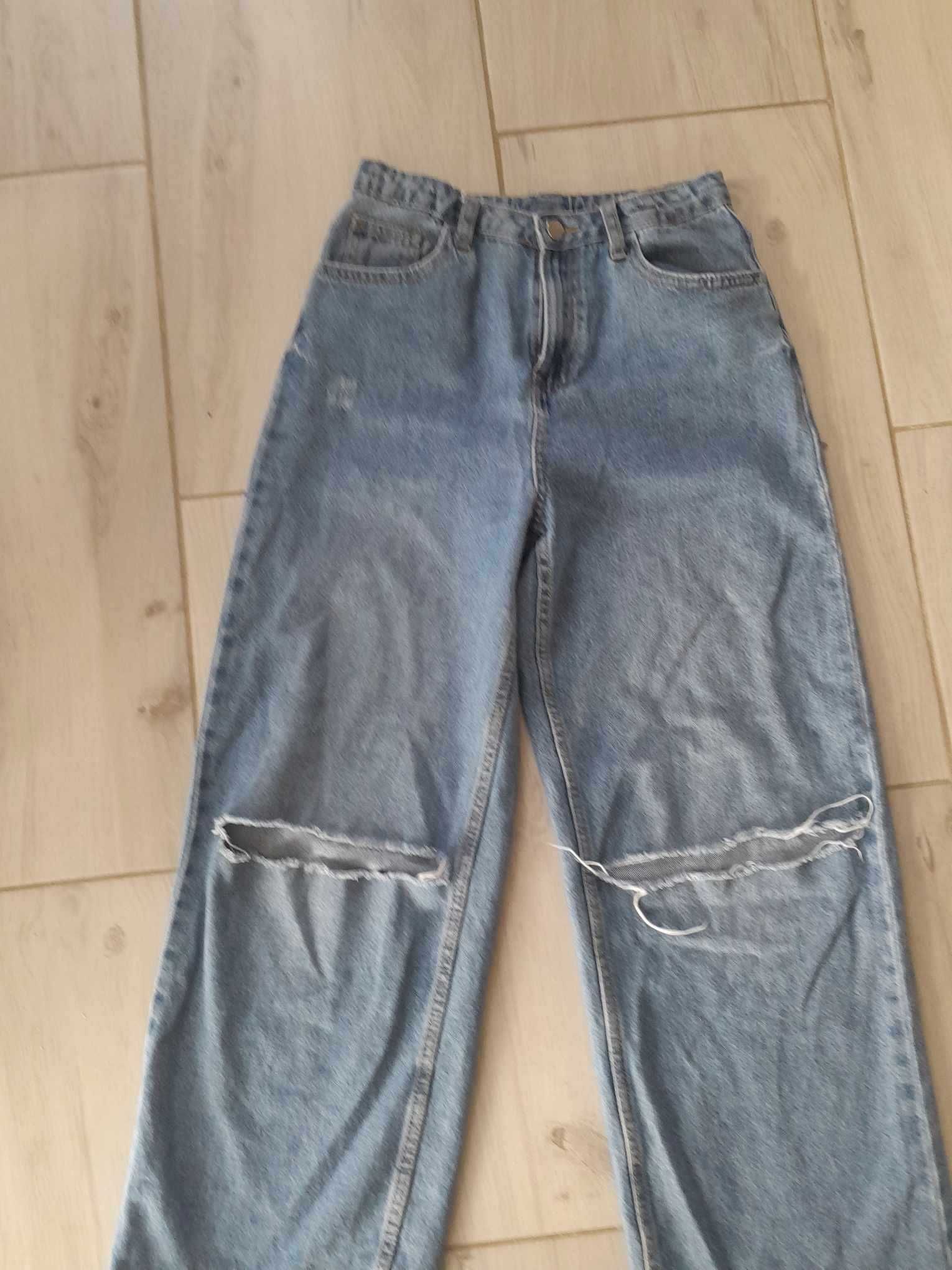 Spodnie jeans dziewczęce z dziurami rozmiar 165