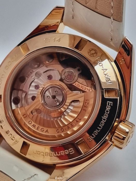 Золотые часы Omega seamaster