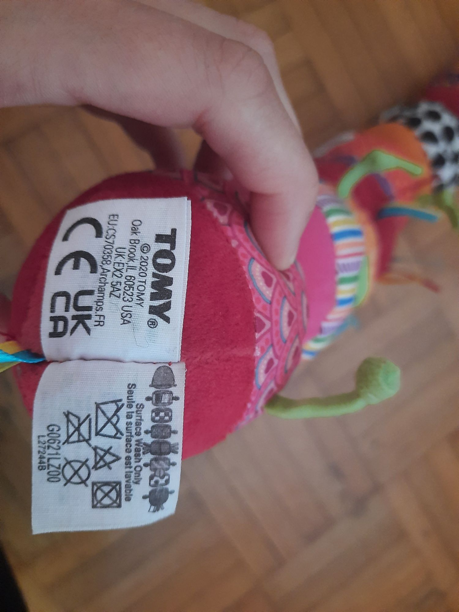 Tomy Lamaze gąsienica sensoryczna mix and mach