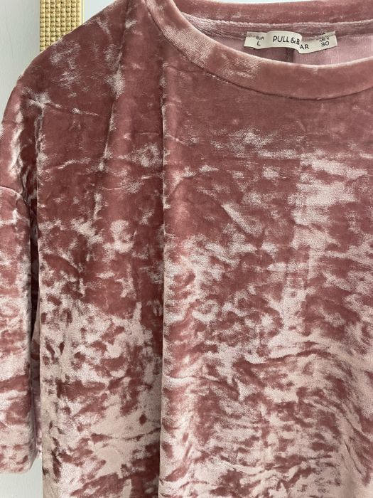 Varias camisolas multicoloridas