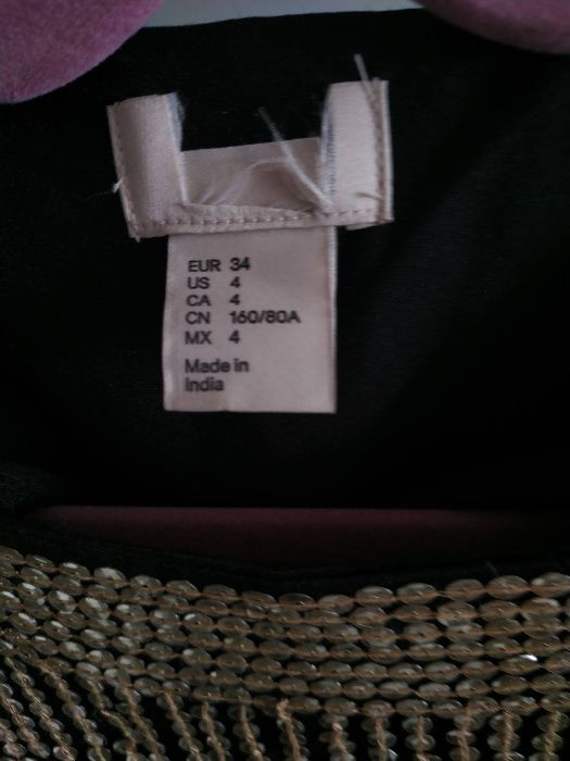czarna sukienka H&M z cekinami
