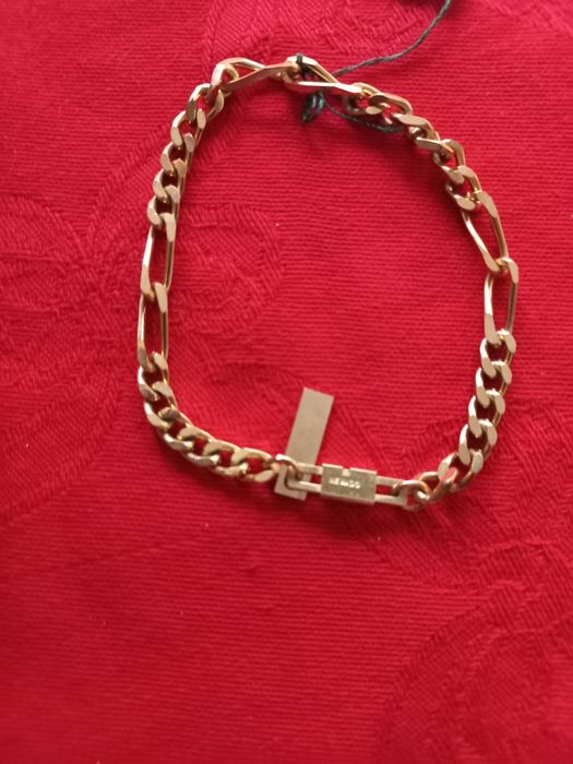 Pulseira dourada,  malha batida, marca Shock